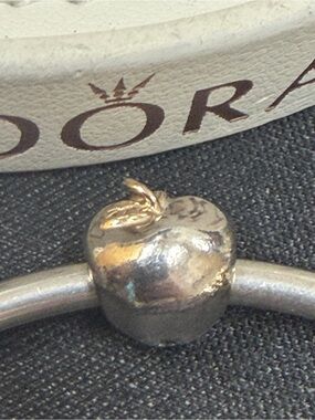Authentic Pandora two tone 14k and Silver Apple Charm